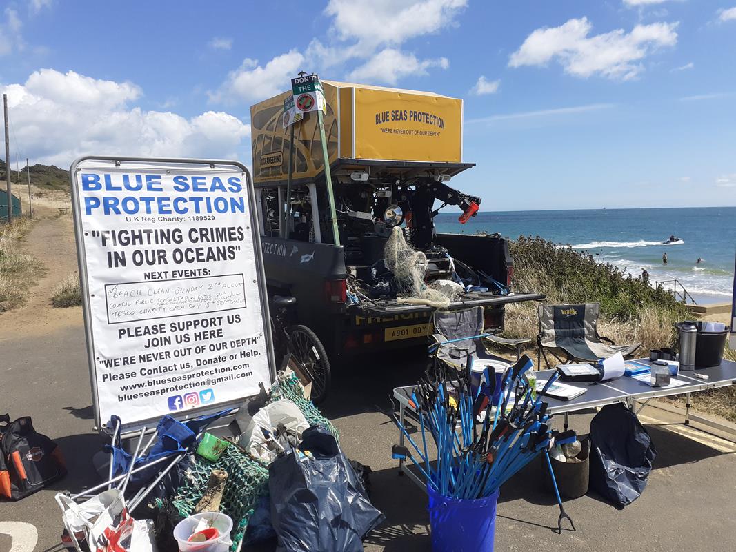 Sandown Beach Clean Display with equipment to pick up plastic debris from the beach and ocean
