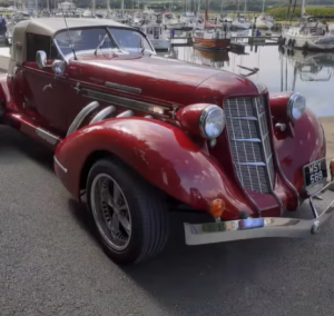Superb example of a Burgundy Classical American Beauty Car used in 1930s to 1950s Film Movies