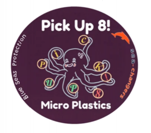 Purple circle with the words in white 'Pick Up 8 Micro Plastics'. In the centre is a colourful cartoon octopus with 8 tentacles each holding a ball. Each ball has a letter in it, which spells out 'Pick Up 8! The logos for Blue Seas Protection and Sea-Changers are discreetly on the opposite sides of the circle, to complete the logo